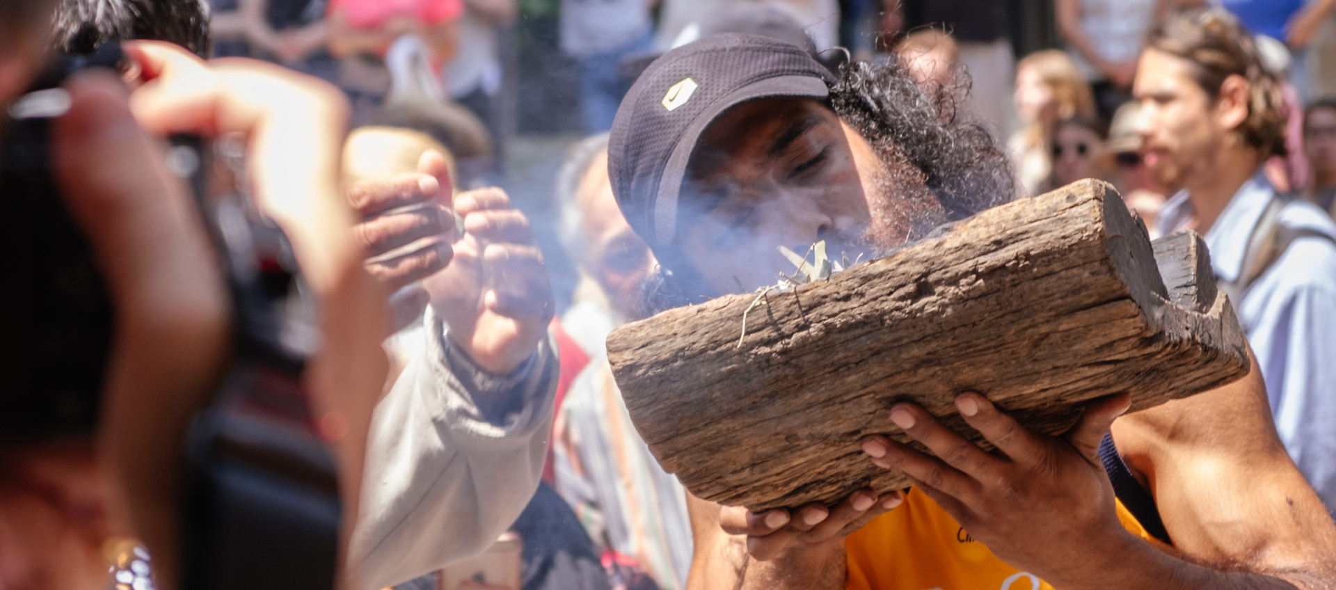Aboriginal Australian conducting a smoking ceremony